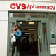 People leave a CVS store in New York City May 21, 2015.
Spencer Platt/Getty Images